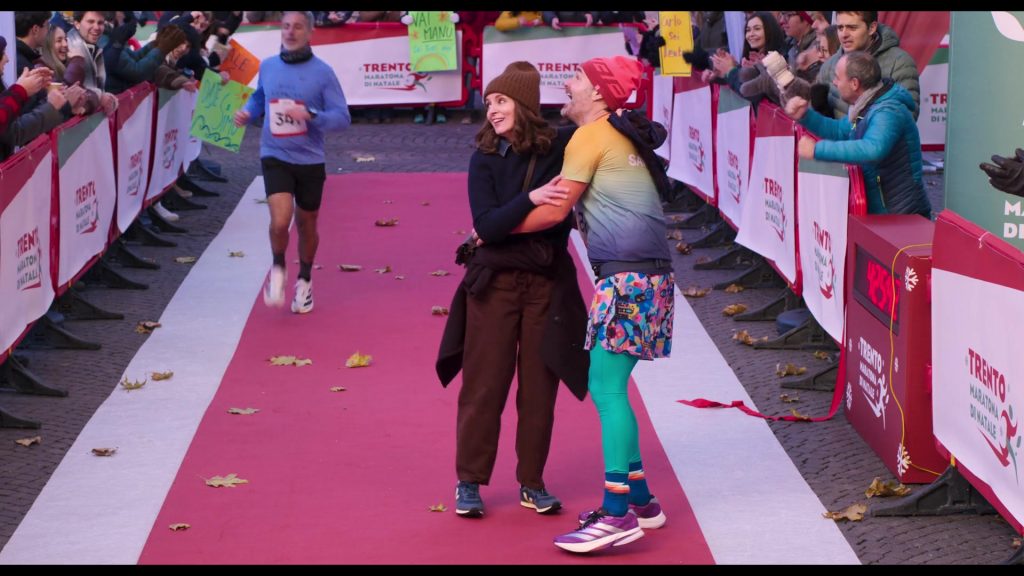 Adidas Adizero Boston 13 running shoes in The Four Seasons S02E08 “Maratona” (2026) (Image 1)
