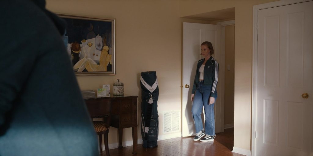 Adidas Jacket and Vans Shoes in Hacks S03E06 “Par for the Course” (2024) (Image 2)