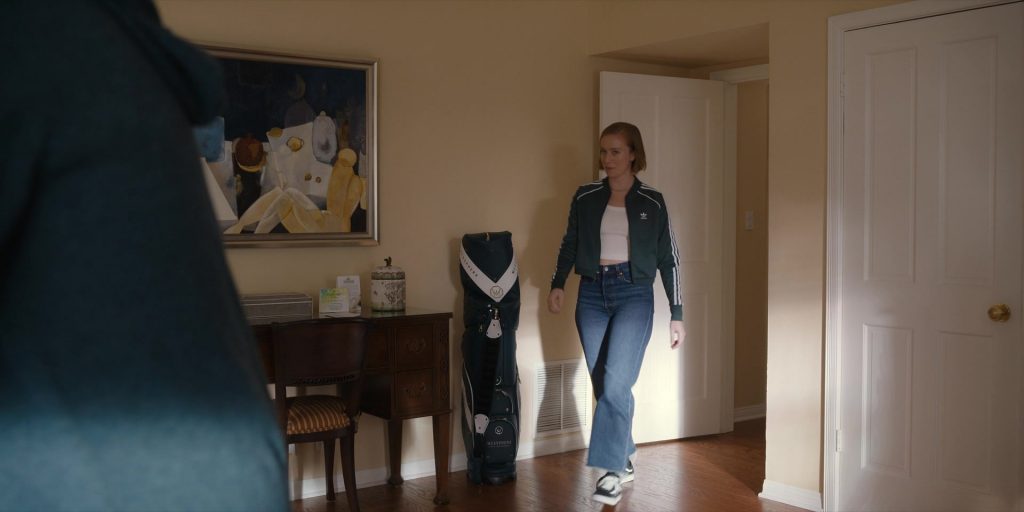 Adidas Jacket and Vans Shoes in Hacks S03E06 “Par for the Course” (2024) (Image 3)