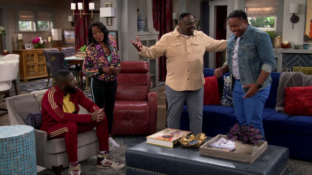 Adidas Red Tracksuit and Sneakers Worn by Sheaun McKinney in The Neighborhood S05E13 “Welcome to the Last Dance” (2023) (Image 1)