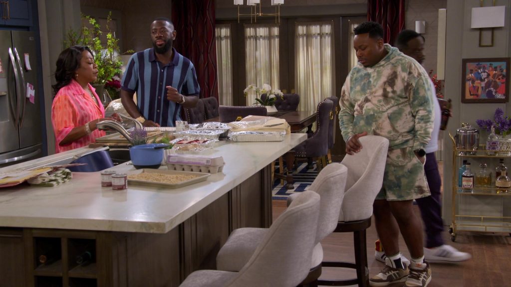 Adidas Shoes, Siempre Tequila, Blanton's Bourbon in The Neighborhood S07E04 “Welcome to the Great Beyond” (2024) (Image 1)