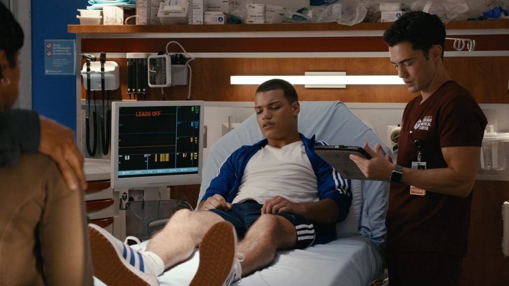 Adidas Sneakers, Shorts and Jacket in Chicago Med S10E02 “Bite Your Tongue” (2024) (Image 1)