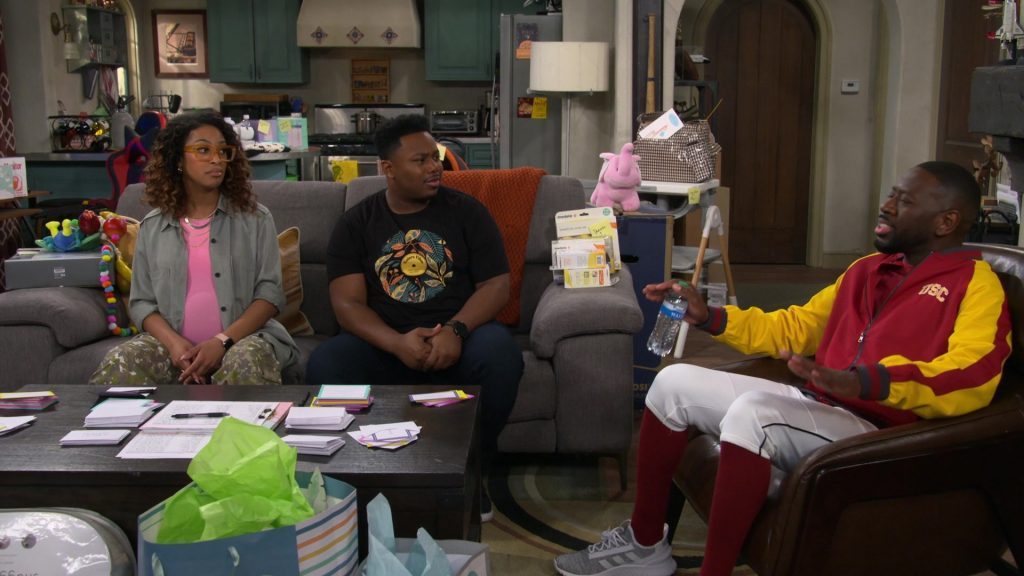 Adidas Sneakers and Medela in The Neighborhood S06E09 “Welcome to the Name Drop” (2024) (Image 1)