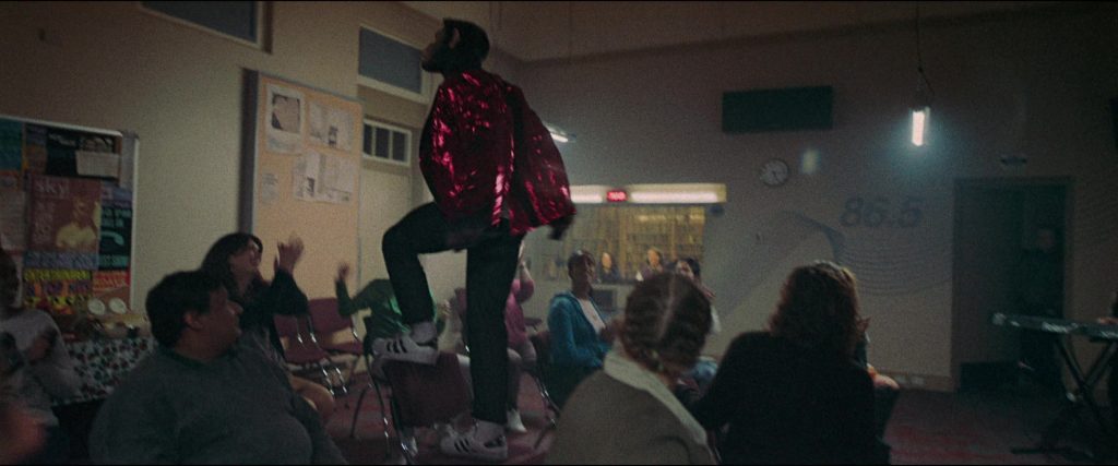 Adidas Sneakers in Better Man (2024) (Image 1)
