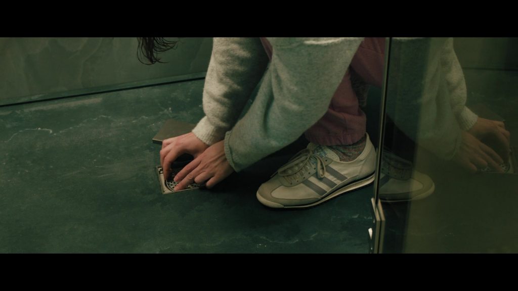 Adidas Sneakers in The Woman in Cabin 10 (2025) (Image 4)