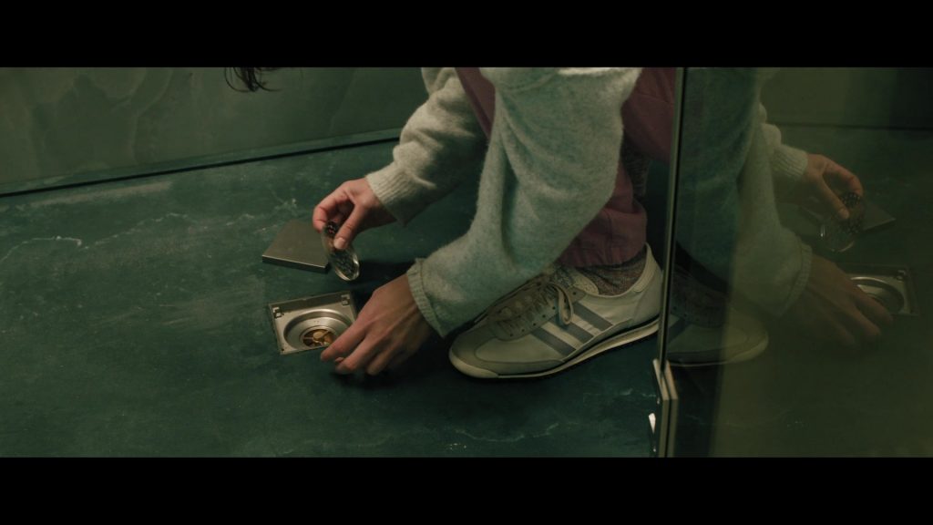 Adidas Sneakers in The Woman in Cabin 10 (2025) (Image 5)
