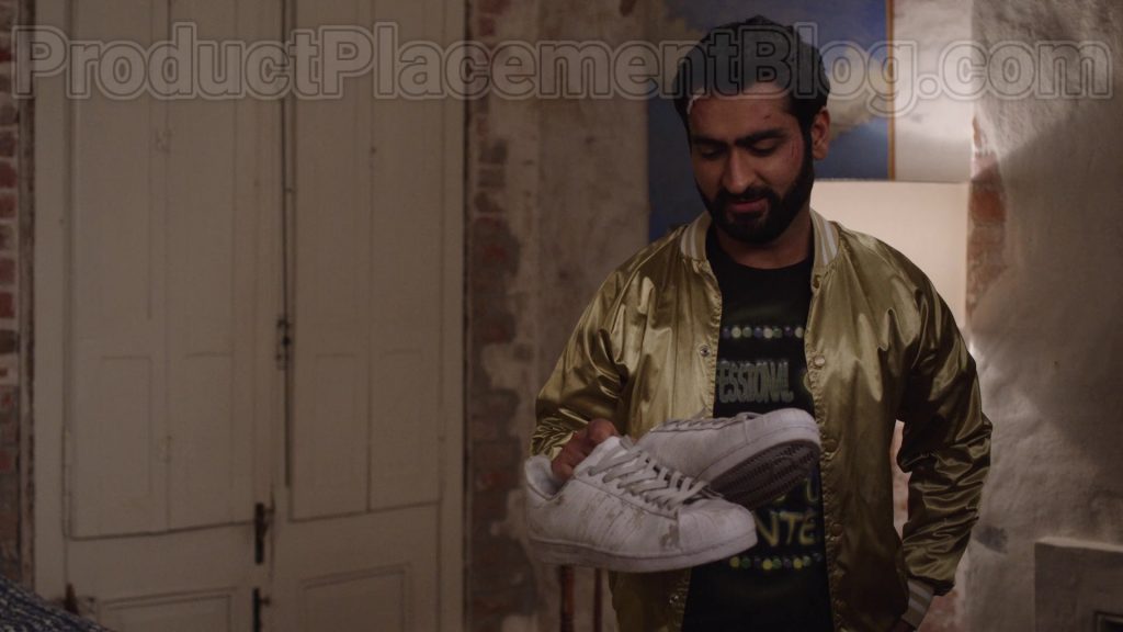 Adidas Superstar White Shoes Held by Kumail Nanjiani in The Lovebirds (2020) (Image 1)