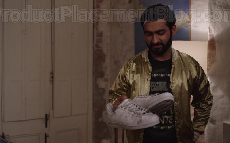 Adidas Superstar White Shoes Held by Kumail Nanjiani in The Lovebirds (2020) (Image 1)