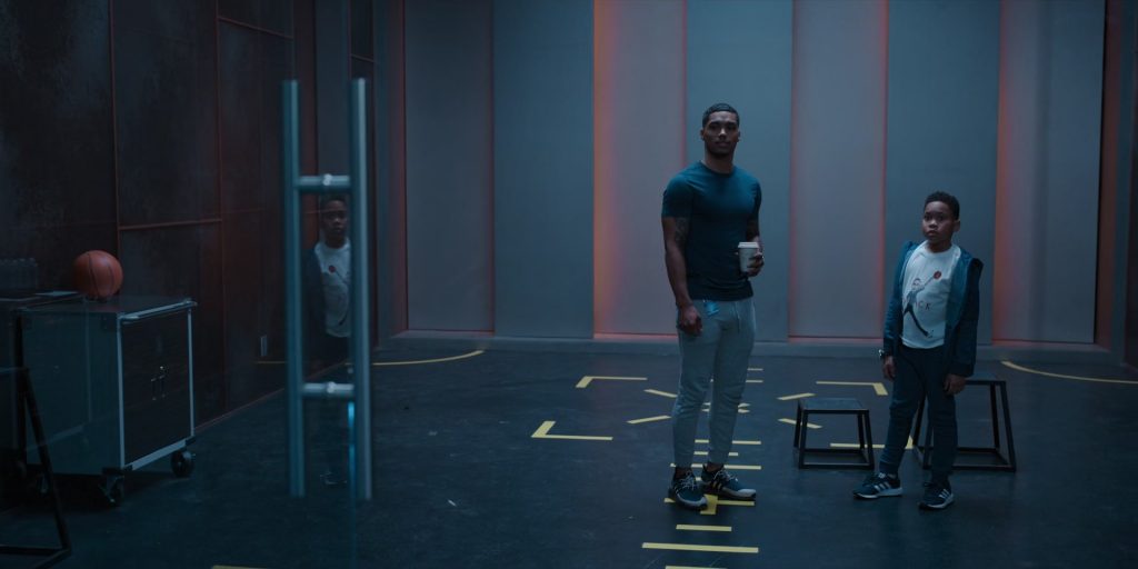 Adidas Swift Run X Shoes and NMD_R1 TR ‘Crew Navy Speckled' Sneakers Worn by Cast Members in Raising Dion S02E01 “ISSUE #201 - A Hero Returns” (2022) (Image 1)
