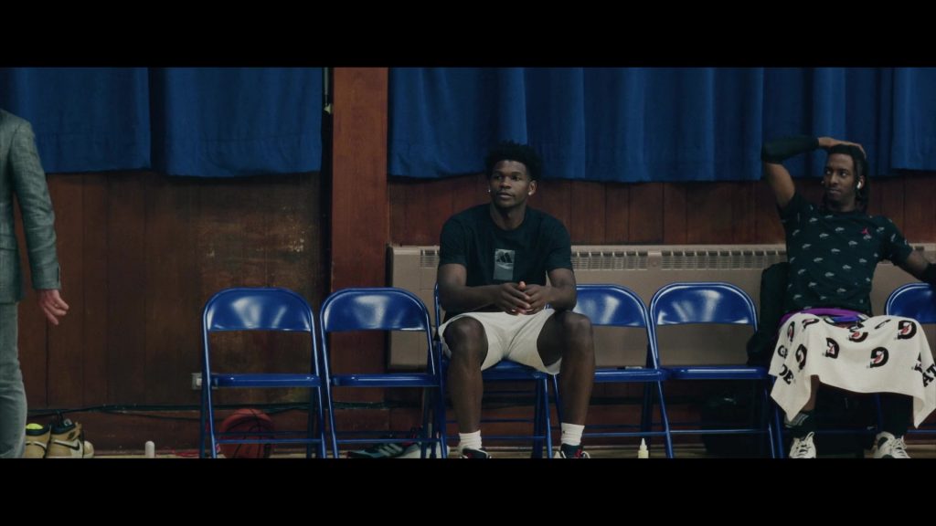 Adidas T-Shirt, Nike AJ Sneakers, Nike Jordan Tee and Gatorade Towel in Hustle (2022) (Image 1)