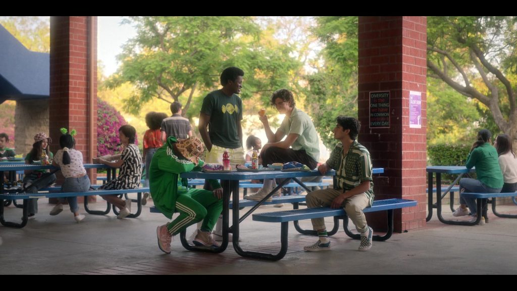 Adidas Tracksuit, Nike, Vans and Converse Sneakers, Doritos Chips in Boo, Bitch S01E01 “Life's a Bitch and Then You Die” (2022) (Image 1)