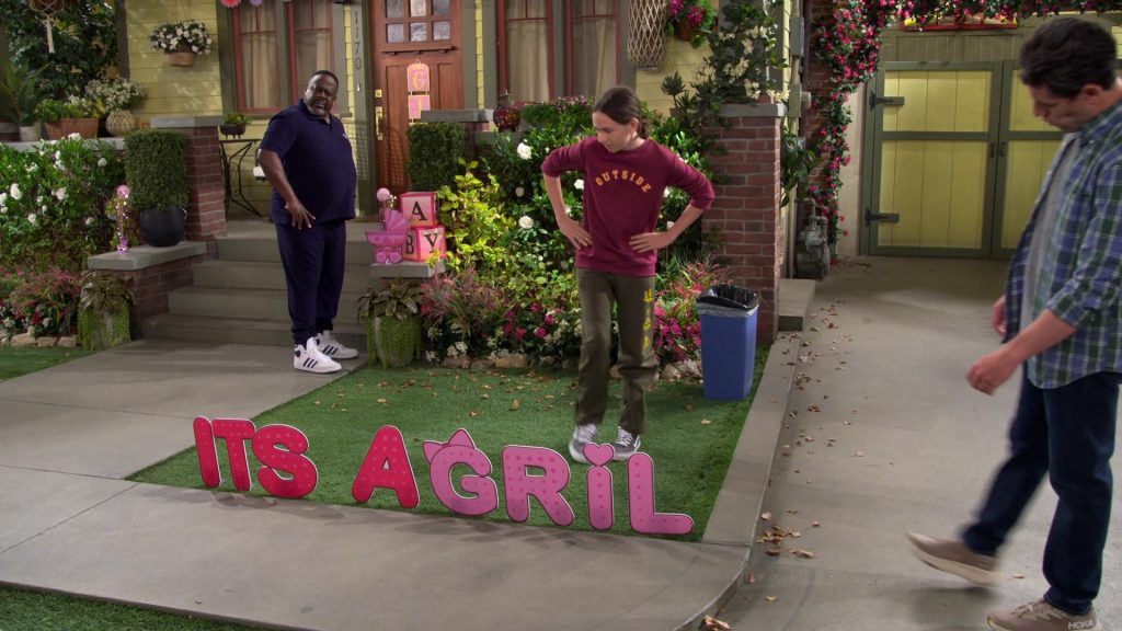 Adidas and Hoka Shoes in The Neighborhood S07E01 “Welcome to the Neighborhood, Daphne” (2024) (Image 1)