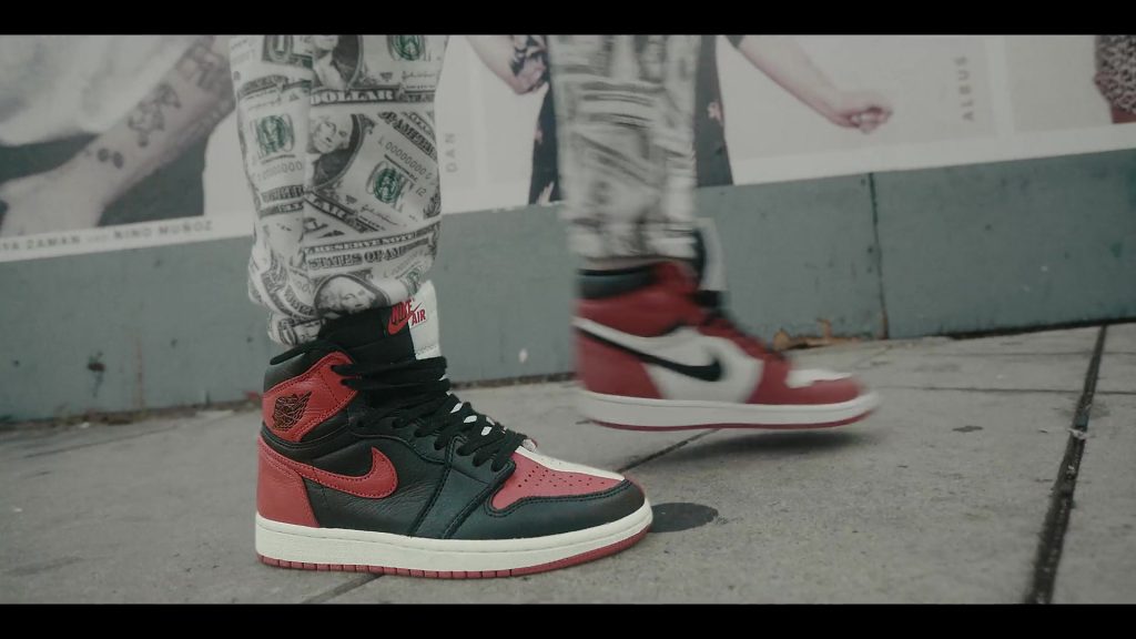 Air Jordan 1 Red-White-Black Retro High Sneakers by Nike in Sneakerheads S01E01 “100% Pure Adrenaline” (2020) (Image 1)