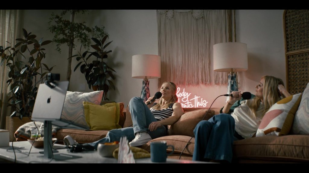 Apple MacBook and Converse Shoes in Nobody Wants This S01E01 (2024) (Image 1)