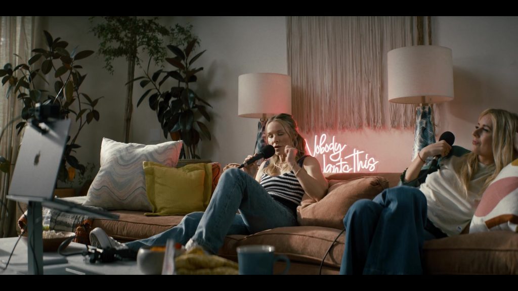 Apple MacBook and Converse Shoes in Nobody Wants This S01E01 (2024) (Image 3)
