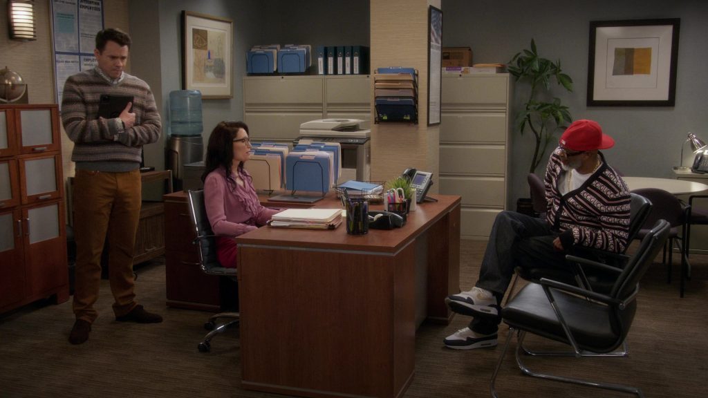 Apple MacBook and Nike Shoes in Poppa's House S01E03 “Podcast” (2024) (Image 1)