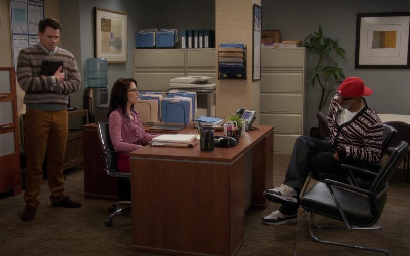 Apple MacBook and Nike Shoes in Poppa's House S01E03 “Podcast” (2024) (Image 1)