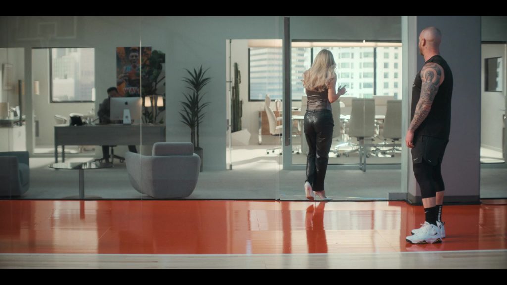 Apple iMac and Nike Air Jordan Sneakers in Running Point S01E03 “The Travis Bugg Affair” (2025) (Image 1)