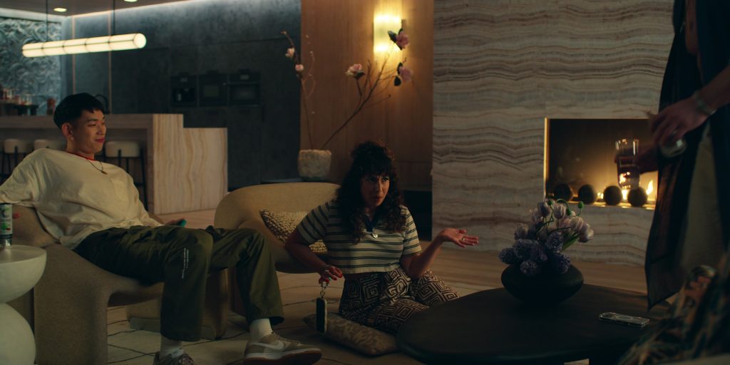 Apple iPhone, Nike Dunk Low SE ‘Light Orewood Gum' sneaker, Celsius in Loot S03E09 “Slide” (2025) (Image 1)