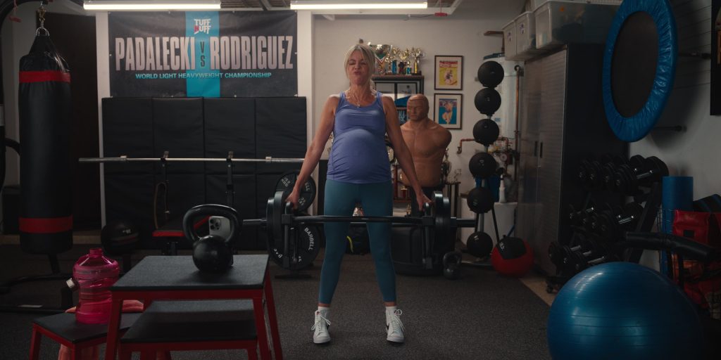 Apple iPhone, Nike Shoes in Hacks S04E06 “Mrs. Table” (2025) (Image 4)