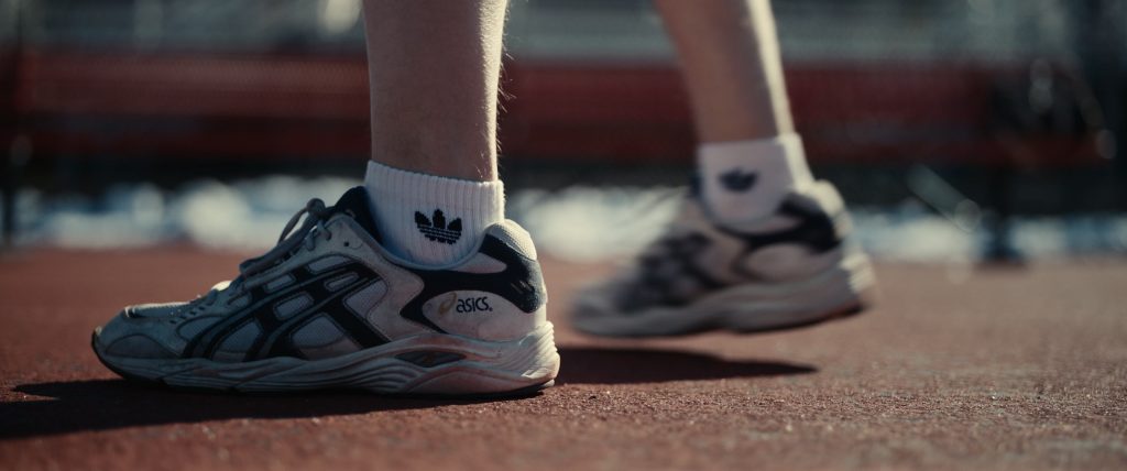 Asics Sneakers and Adidas Socks of Paul Dano as Keith Gill in Dumb Money (2023) (Image 1)