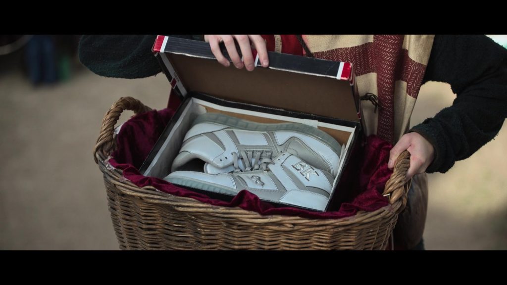 British Knights (BK Footwear) in Mrs. Davis S01E03 “A Baby with Wings, a Sad Boy with Wings and a Great Helmet” (2023) (Image 2)