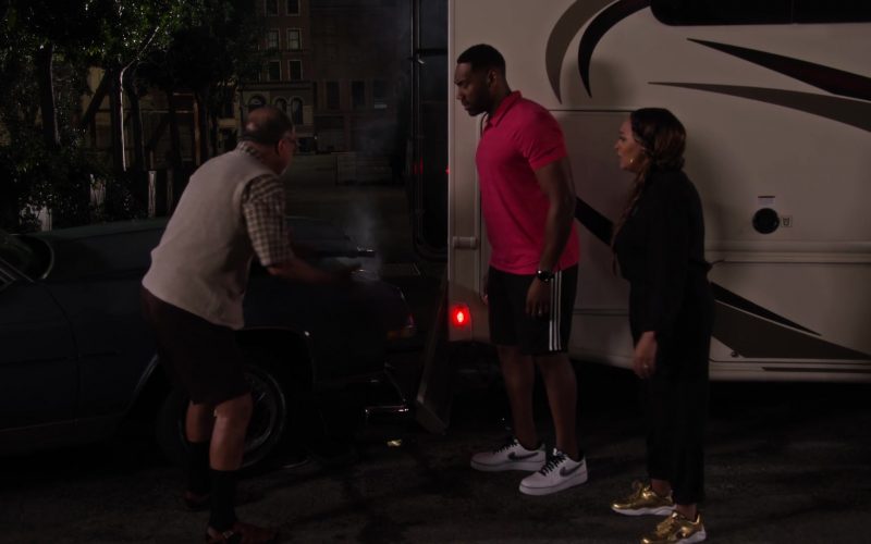 Champion Gold Sneakers Worn by Tia Mowry and Nike Shoes Worn by Anthony Alabi in Family Reunion – Season 1 Episode 6, “Remember That Crazy Road Trip” (2019) (Image 1)