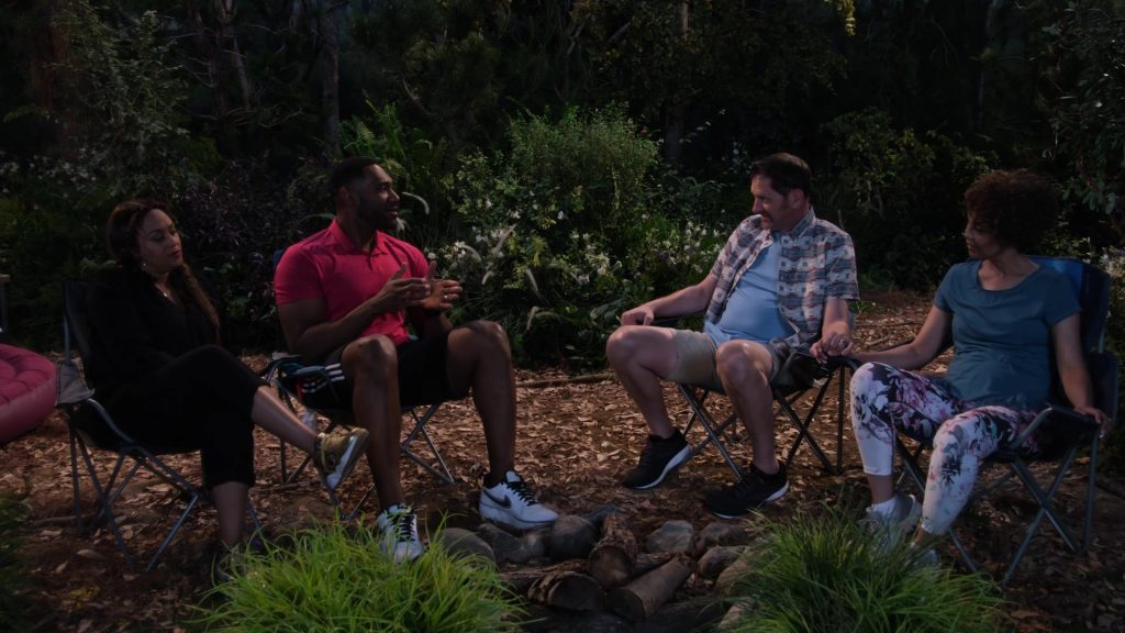 Champion Gold Sneakers Worn by Tia Mowry and Nike Shoes Worn by Anthony Alabi in Family Reunion – Season 1 Episode 6, “Remember That Crazy Road Trip” (2019) (Image 3)