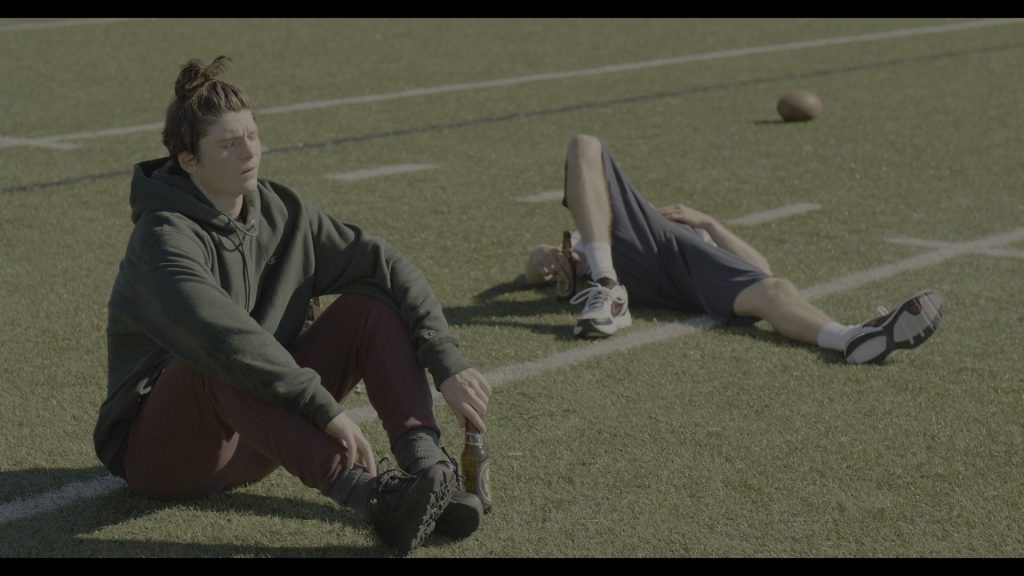 Champion Green Hoodie and Nike Sneakers in The Society – Season 1, Episode 2, Our Town (2019) (Image 1)
