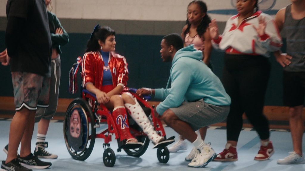 Champion Shorts, Converse, Nike and Asics Shoes in Stumble S01E02 “Media Day” (2025) (Image 1)