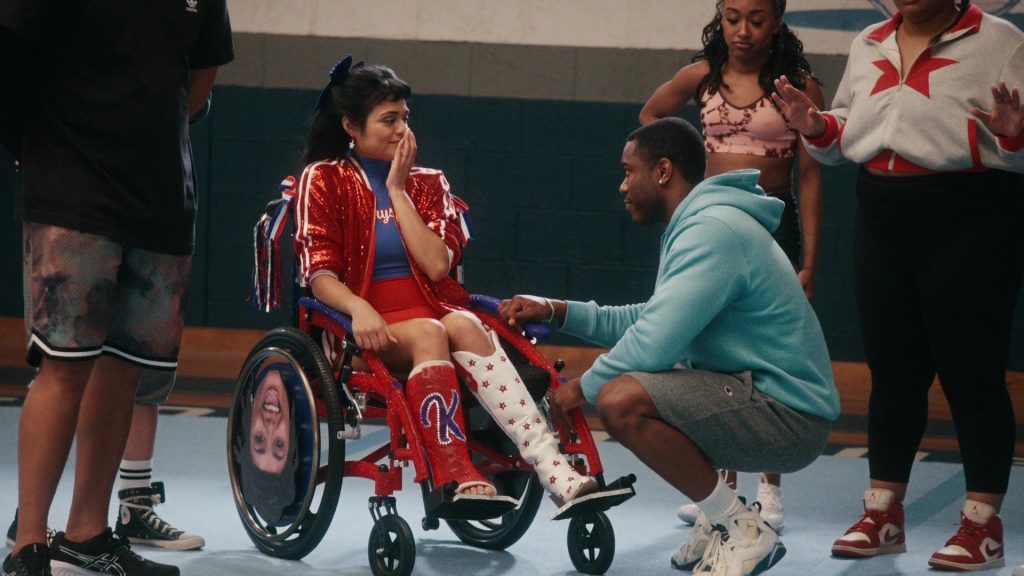Champion Shorts, Converse, Nike and Asics Shoes in Stumble S01E02 “Media Day” (2025) (Image 2)