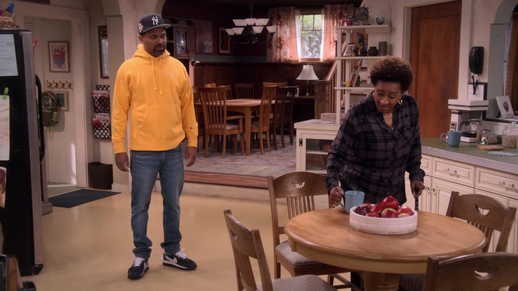 Champion Yellow Hoodie and Nike Sneakers Worn by Mike Epps as Bennie in The Upshaws S03E08 “Now What” (2023) (Image 1)