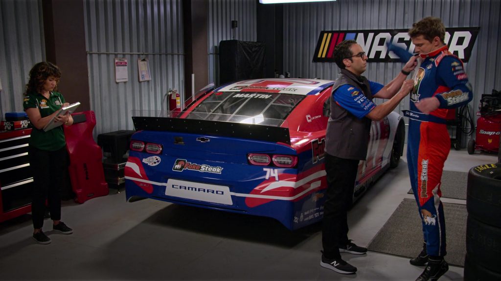 Chevrolet Camaro Sports Car and New Balance Sneakers of Dan Ahdoot as Amir in The Crew S01E06 “We're Gonna Be Okay. We're Gonna Be Okay.” (2021) (Image 1)