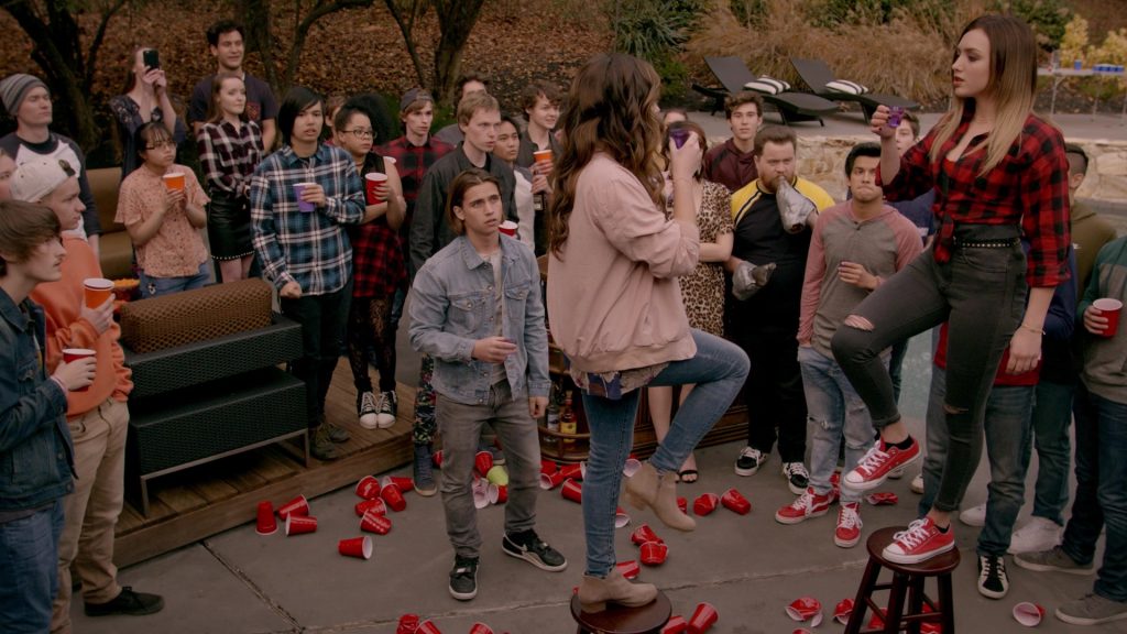 Converse All Star Red Shoes of Peyton List as Tory Nichols in Cobra Kai S02E09 “Pulpo” (2019) (Image 2)