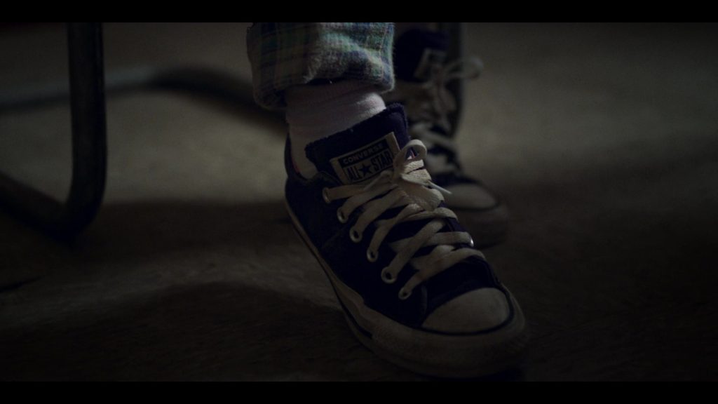 Converse All Star Shoes in Archive 81 S01E01 “Mystery Signals” (2022) (Image 1)