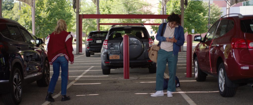Converse Shoes and Herschel Bag in Sweethearts (2024) (Image 1)