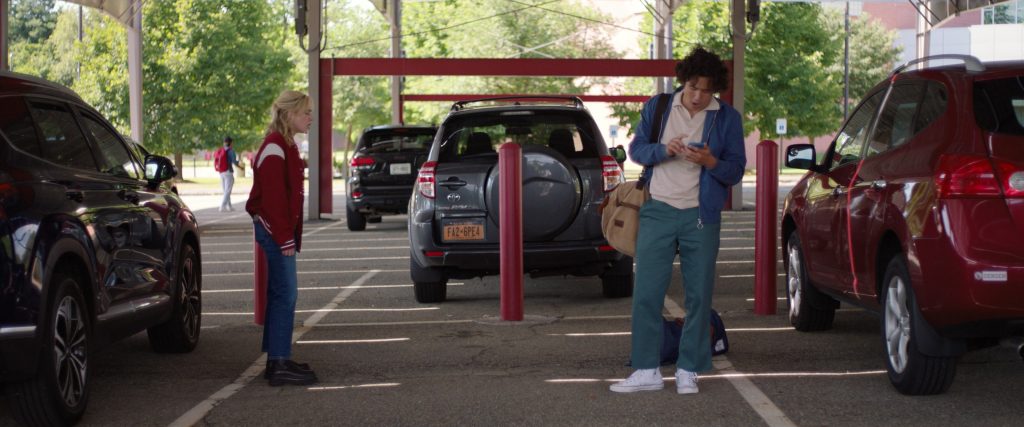 Converse Shoes and Herschel Bag in Sweethearts (2024) (Image 4)