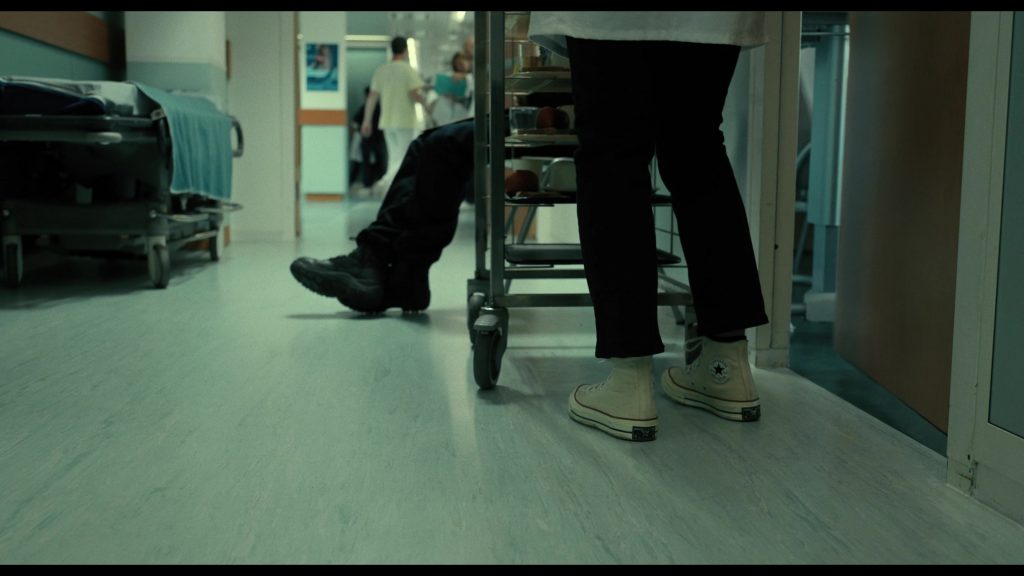 Converse Shoes in The Killer (2024) (Image 10)