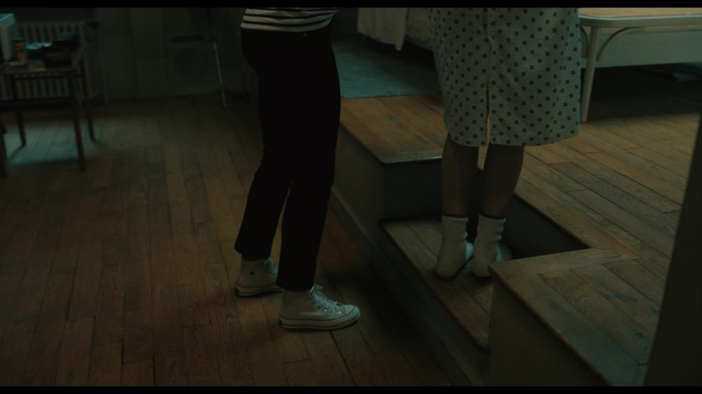 Converse Shoes in The Killer (2024) (Image 2)