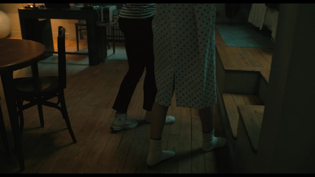 Converse Shoes in The Killer (2024) (Image 5)