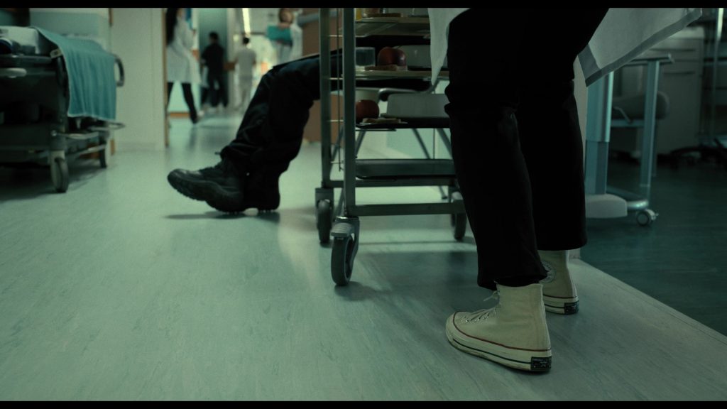 Converse Shoes in The Killer (2024) (Image 7)