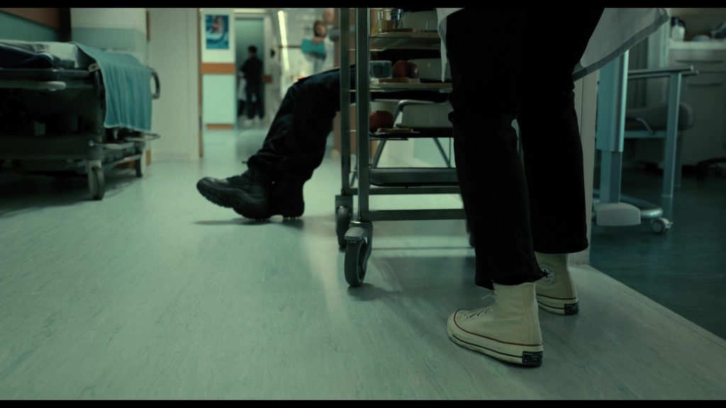 Converse Shoes in The Killer (2024) (Image 8)