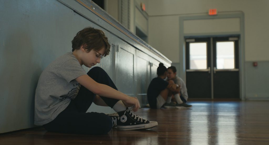 Converse Shoes in The Life of Chuck (2024) (Image 1)