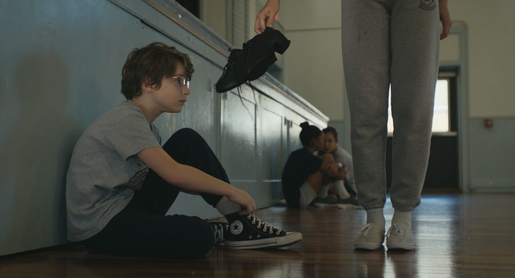 Converse Shoes in The Life of Chuck (2024) (Image 4)