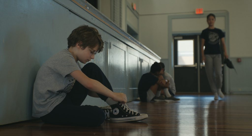 Converse Shoes in The Life of Chuck (2024) (Image 8)