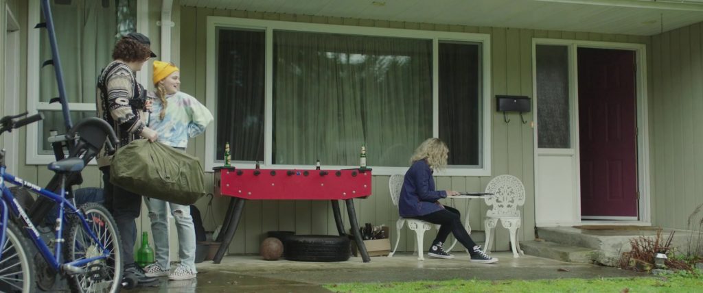 Converse Shoes of Katherine Langford as Mara Carlyle in Spontaneous (2020) (Image 1)