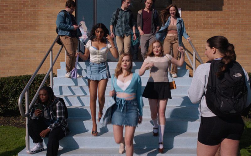 Converse Sneakers and The North Face Backpack in Mean Girls (2024) (Image 1)
