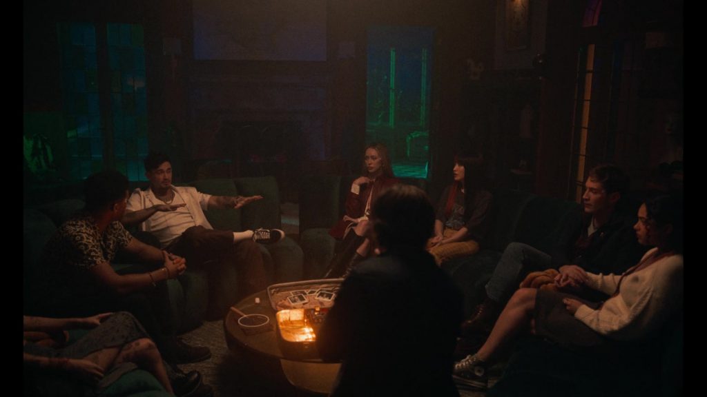 Converse Sneakers in It's What's Inside (2024) (Image 7)