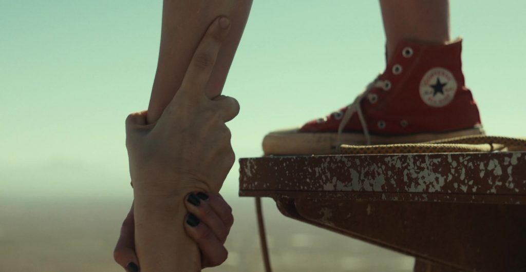 Converse Sneakers of Virginia Gardner as Shiloh Hunter in Fall (2022) (Image 2)
