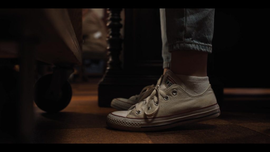 Converse White Low Top Shoes of Sabrina Carpenter in Work It (2020) (Image 1)